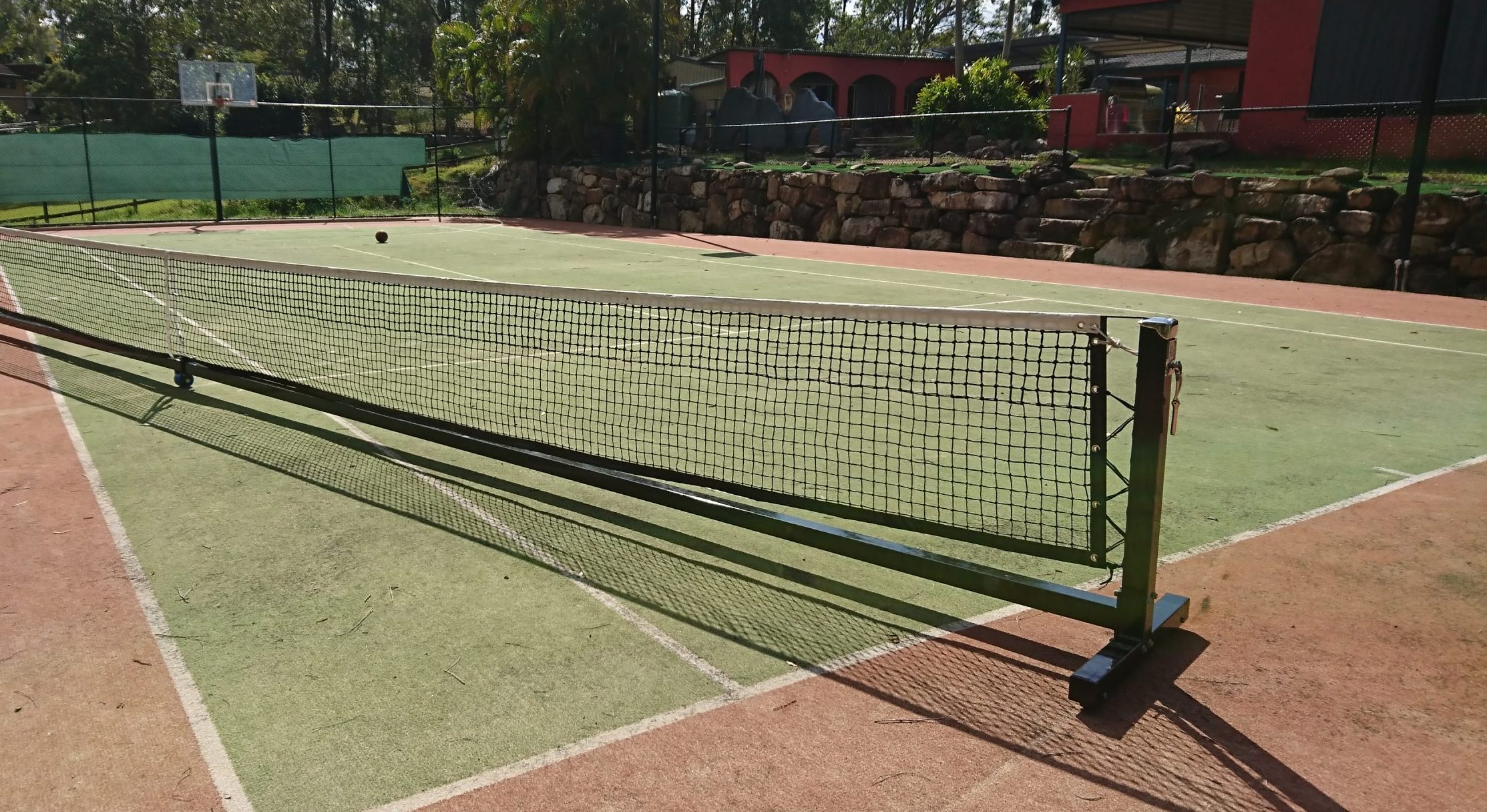 Playhard sports, play hard sports, play hard sports equipment, Playhard, tennis posts, tennis net, tennis posts and net, tennis, tennis equipment, tennis court, tennis net winder, tennis net on wheels, tennis court net pole, pivot tennis, wheelaway tennis