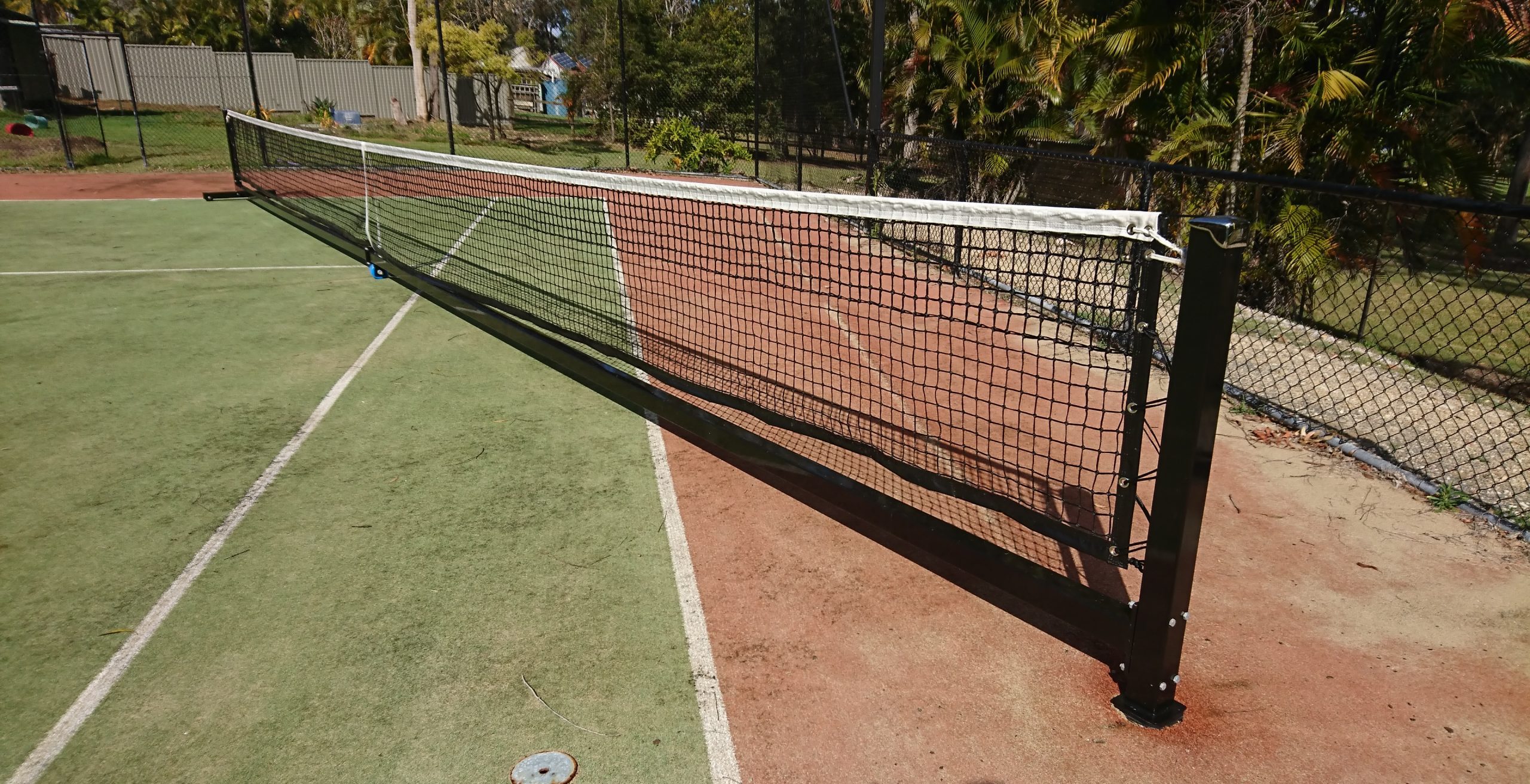 Playhard sports, play hard sports, play hard sports equipment, Playhard, tennis posts, tennis net, tennis posts and net, tennis, tennis equipment, tennis court, tennis net winder, tennis net on wheels, tennis court net pole, pivot tennis